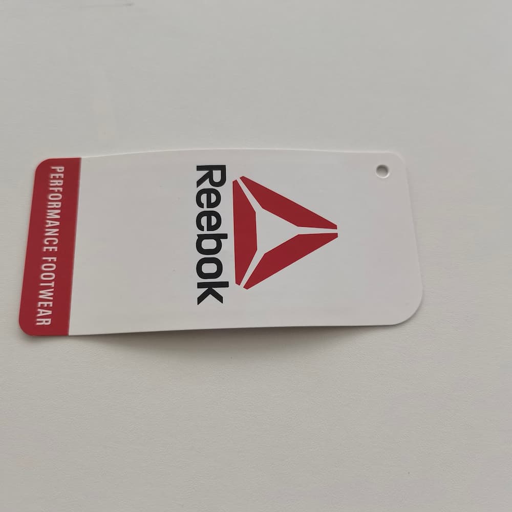 Rounded corner footwear hang tag